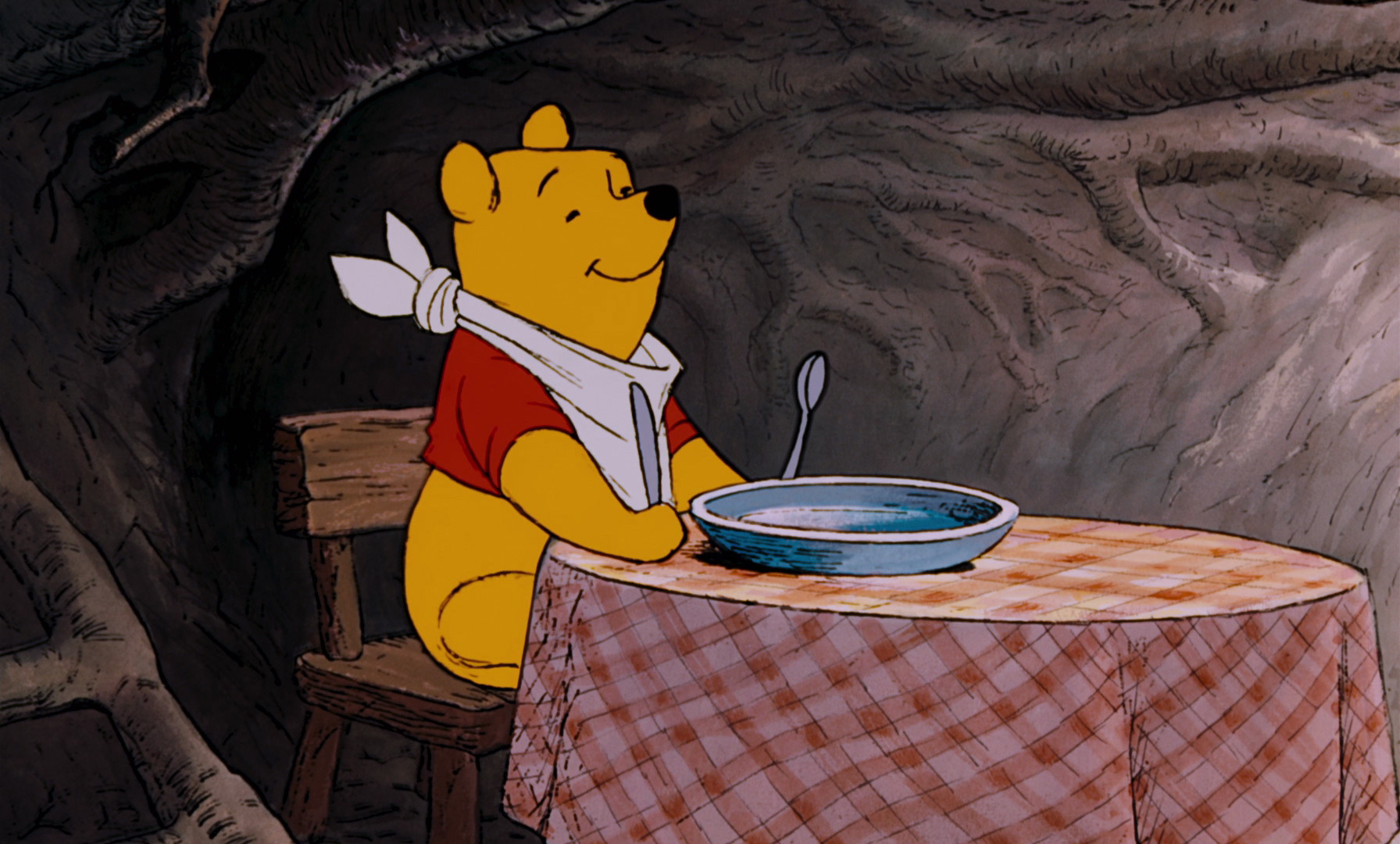 Winnie the Pooh prepares to eat